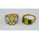 A 9ct. Gold Dress Ring set three green stones, ring size N, 2.5 gms. together with another similar