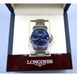 A Longines Conquest Stainless Steel Cased Gentleman's Wrist Watch, the blue dial with date
