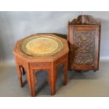An Indian carved hardwood folding table with pierced brass tray together with a Victorian carved oak