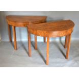 A Pair of 19th Century Marquetry Inlaid Demi-Lune Console Tables, the crossbanded and inlaid tops