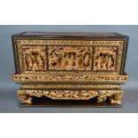 A Chinese Lacquered and Gilded Altar Piece of rectangular form, 48 cms long, 32 cms high