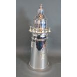 A Silver Plated Cocktail Shaker in the form of a Lighthouse, 35 cms tall