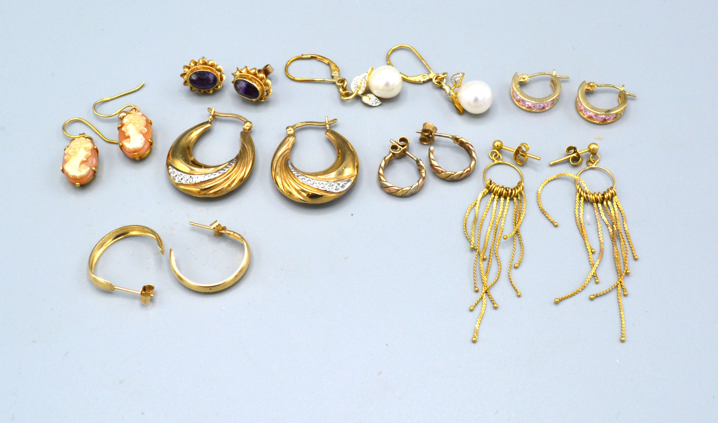 A Collection of 9ct. Gold Earrings and Ear Studs, 17.7 gms.