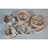 A Collection of Silver Bangles and similar bracelets