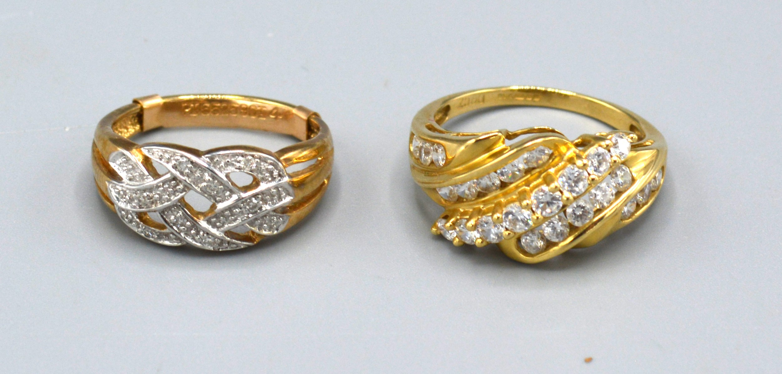 A 9ct. Gold Diamond Set Ring, ring size L, 2.8 gms. together with a 9ct. gold dress ring, ring