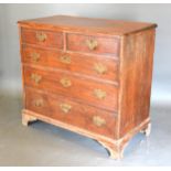 A 19th Century Straight Front Chest, the inlaid top above two short and three long drawers with