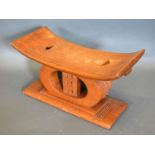 An African Carved Hardwood Headrest of Shaped Form 36.5 cms long x 17.5 cms and 20 cms high