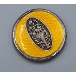 A Continental Silver and Yellow Enamel Compact of circular form, 5.5 cms diameter
