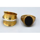 A 9ct. Gold Band Ring of stylised form, ring size O, 4.1 gms. together with a 9ct. gold signet ring,