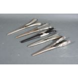A Pair of Edwardian Silver Glove Stretchers in the Secessionist Style together with four other pairs