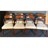 A Set of Eight Regency Mahogany Dining Chairs comprising two armchairs and six singles all with
