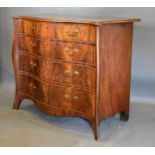 A 19th Century Mahogany Serpentine Commode, the moulded inlaid and crossbanded top above four