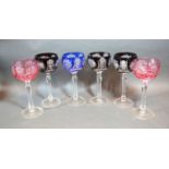 A Set of Six Cut Glass Hock Glasses with star cut decoration, 19 cms tall