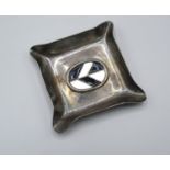 A London Silver Small Pin Tray of shaped design with enamel decorated central panel 7.5 cms square