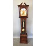 A 20th Century Mahogany Long Case Clock, the brass dial with Roman numerals and moon phase movement