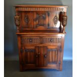 A 20th century oak court cupboard together with a similar display cabinet