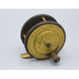 Eaton and Deller a brass mounted fishing reel, 6.5cms diameter