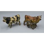 A Late 19th/Early 20th Century Cold Painted Bronze Model of a Bull, 8 cms long, together with