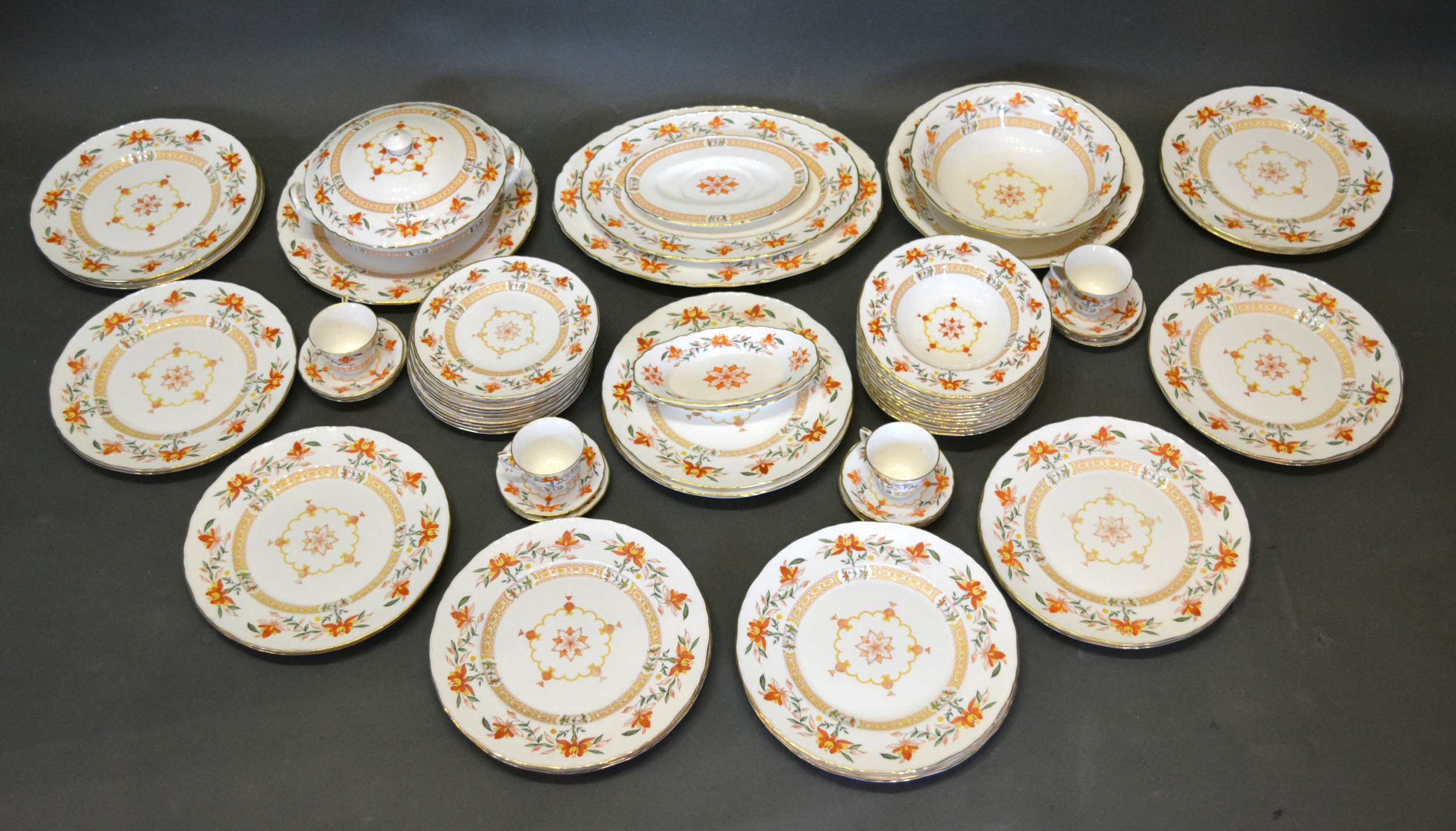 A Royal Worcester Chamberlain Pattern Dinner Service comprising plates, a covered tureen, soup