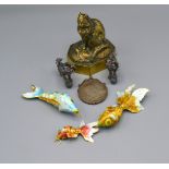 A Brass Model in the form of a Cat, a pair of enamel decorated Dogs of Fo, a group of three Pendants