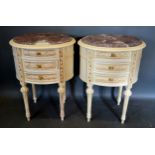 A Pair of French Cream Painted Oval Chests, the variegated marble tops above three drawers raised