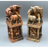 A Pair of Chinese Soapstone Large Table Seals, each carved with buffalo and with simulated bamboo