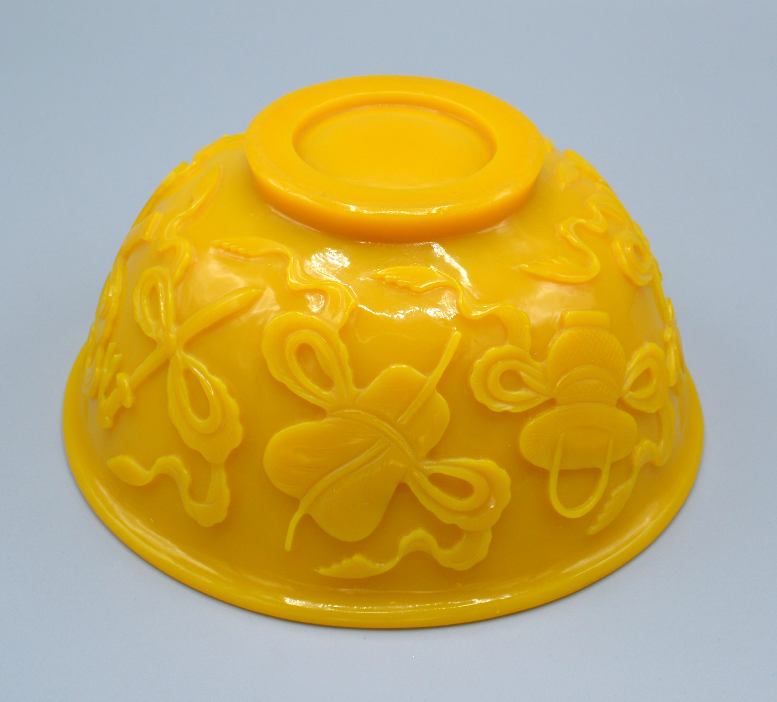 A Chinese Yellow Glass Bowl carved in relief with implements and scrolls, 15.5 cms diameter - Image 2 of 3