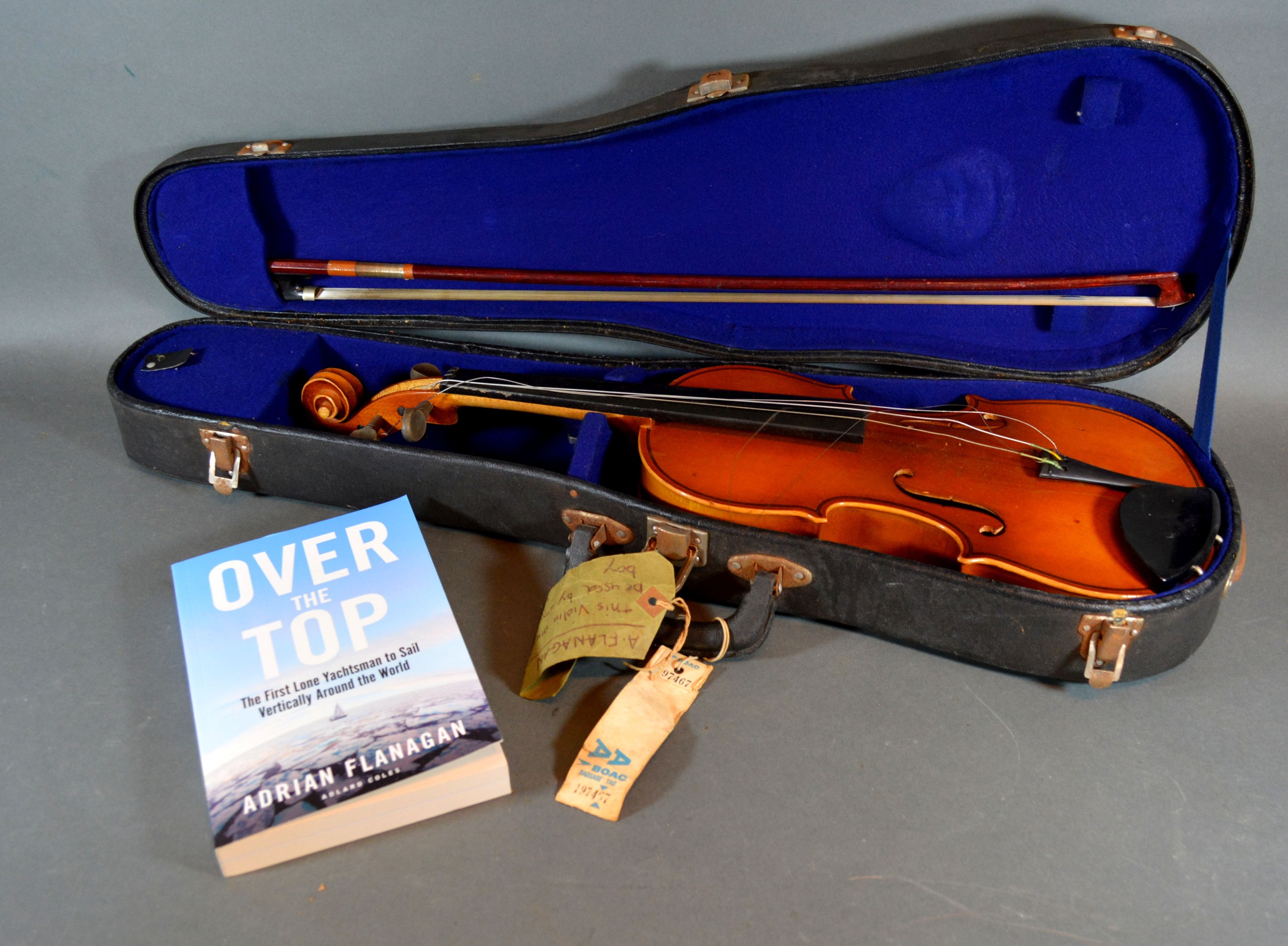 A Violin by the Kiso Suzuki Violin Company Ltd. with ebony fret board within fitted case belonging