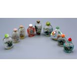 A Collection of Eight Chinese Glass Scent Bottles together with a similar Chinese porcelain scent
