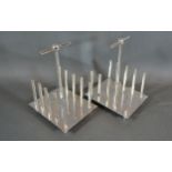 A Pair of Silver Plated Four Division Toast Racks in the style of Christopher Dresser