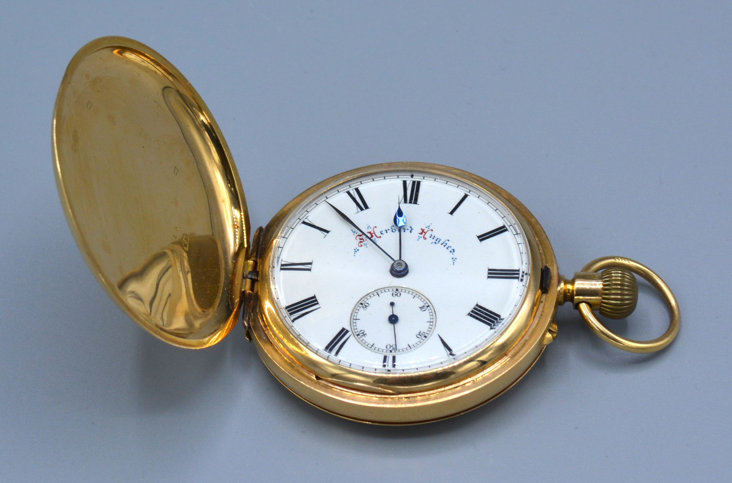 An 18ct. Gold Cased Full Hunter Pocket Watch, the enamel dial inscribed Herbert Hughes, 62 gms