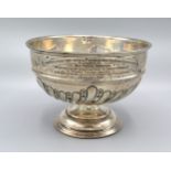 A George V Silver Rose Bowl of Half Lobed Form with circular pedestal base Birmingham 1912, 13