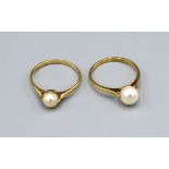 A 9ct. Gold Pearl Set Dress Ring together with another similar 9ct. gold pearl set dress ring 3.6