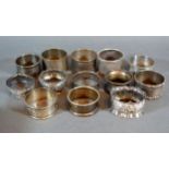 A Collection of Thirteen Silver Napkin Rings, 6 ozs.