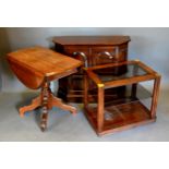 A Burr Walnut Occasional Table by Wieman together with a two door side cabinet and a drop flap