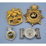 The Hampshire Regiment Belt Buckle together with a Southern Division Artillery Badge and two other