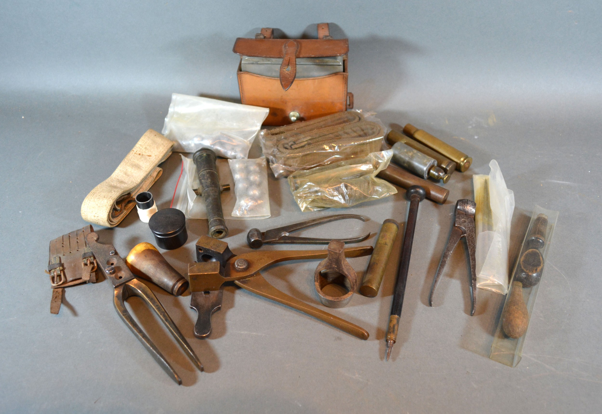 A Collection of Bullet Moulds and related items
