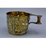 A Victorian Silver Gilt Vapheio Cup embossed with figures and bulls and with shaped handle Chester