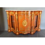 A French style walnut, gilt metal mounted serpentine Credenza cabinet, the variegated marble top