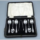 A Set of Six Birmingham Silver Teapoons with matching tongs within fitted case