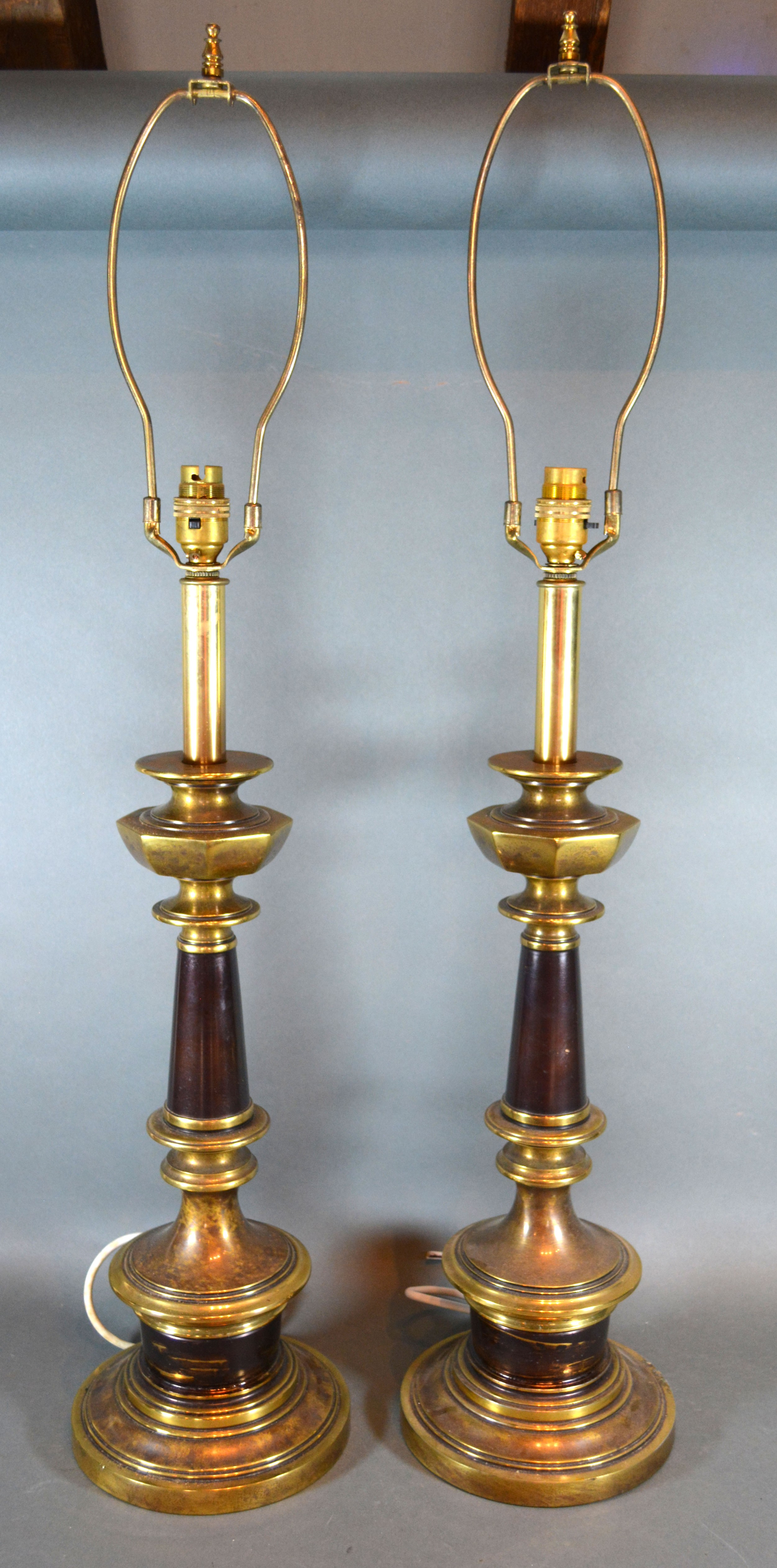 A Pair of Patinated Metal Table Lamps 60 cms tall