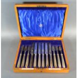 A Set of Six London Silver Dessert Knives and Forks within fitted case retailed by The Goldsmiths