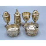 A Pair of Victorian Silver Pedestal Peppers Sheffield 1891 together with a Sheffield Silver three