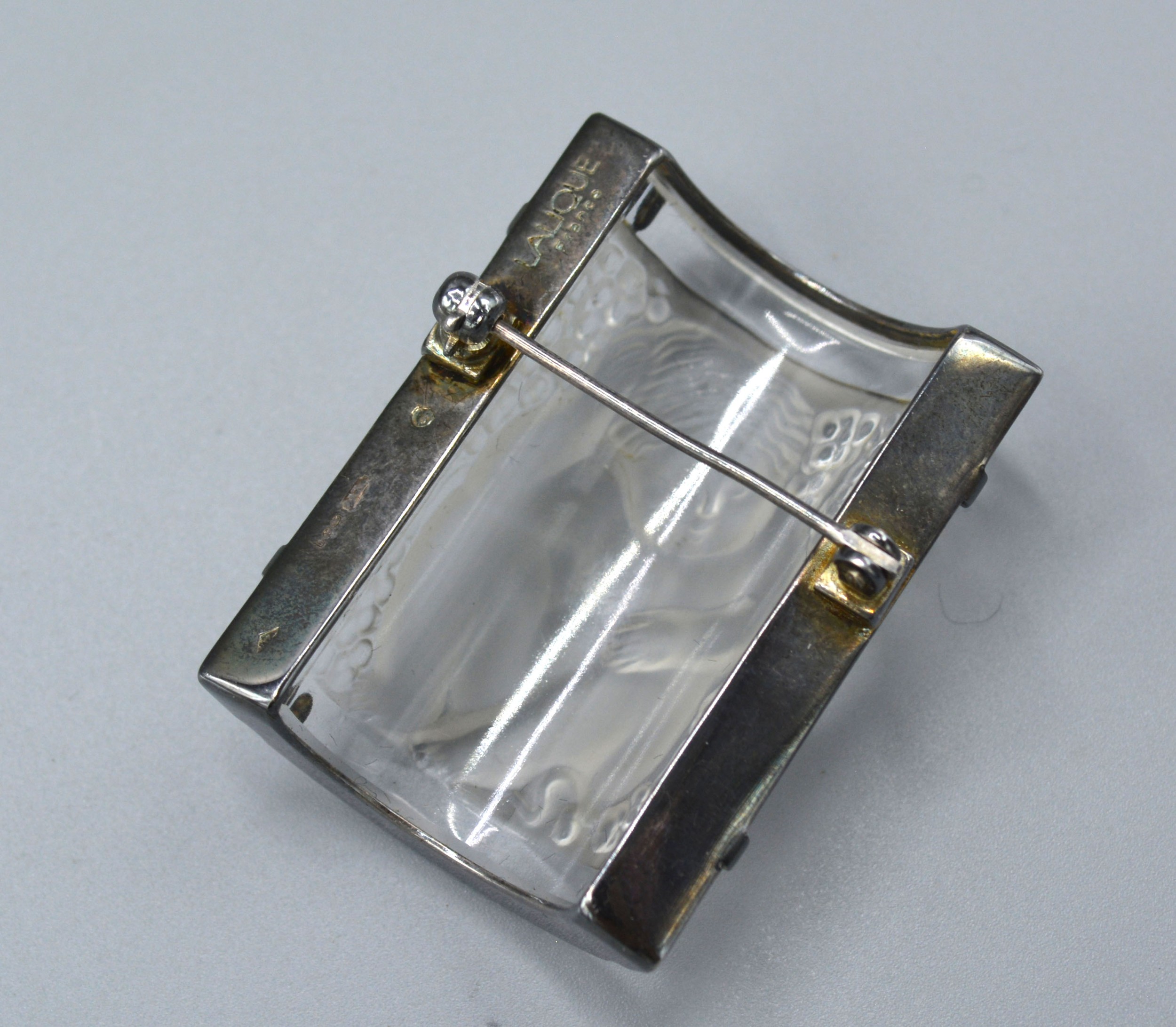 A Lalique Glass Brooch within 925 silver frame marked Lalique France, 4 x 3 cms - Image 2 of 2
