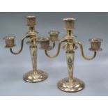 A Pair of Sterling Silver Three Branch Candelabrum 44 ozs. 28 cms tall
