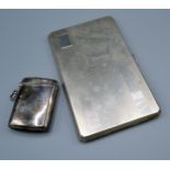 A Birmingham Silver Cigarette Case with engine turned decoration together with a London silver vesta
