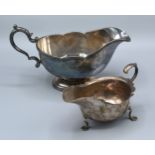 A Sterling Silver Sauce Jug together with a Sheffield Silver Sauce Jug, 15 ozs.