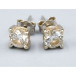 A Pair of 18ct. Gold Diamond Ear Studs approx. 0.50 ct. each claw set