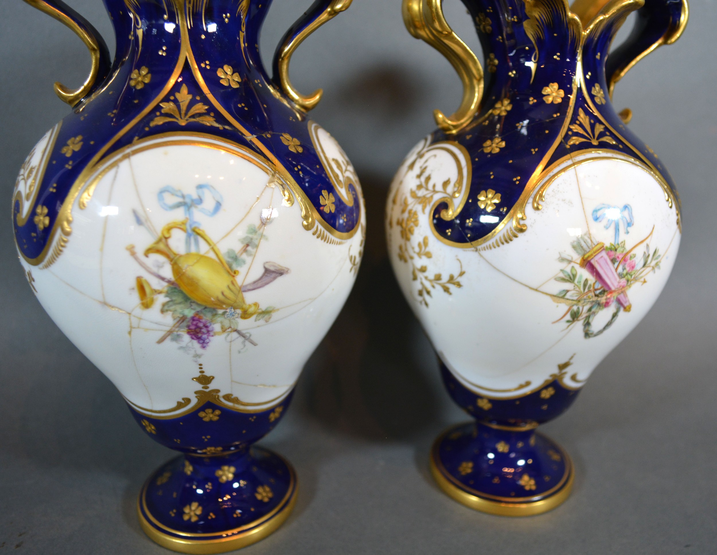 A Pair of Mintons Porcelain Vases of oviform hand painted with putti upon a cobalt blue and white - Image 3 of 4