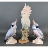 A Royal Dux Porcelain Model of a Cockatoo, 42 cms tall together with a pair of Crown Staffordshire